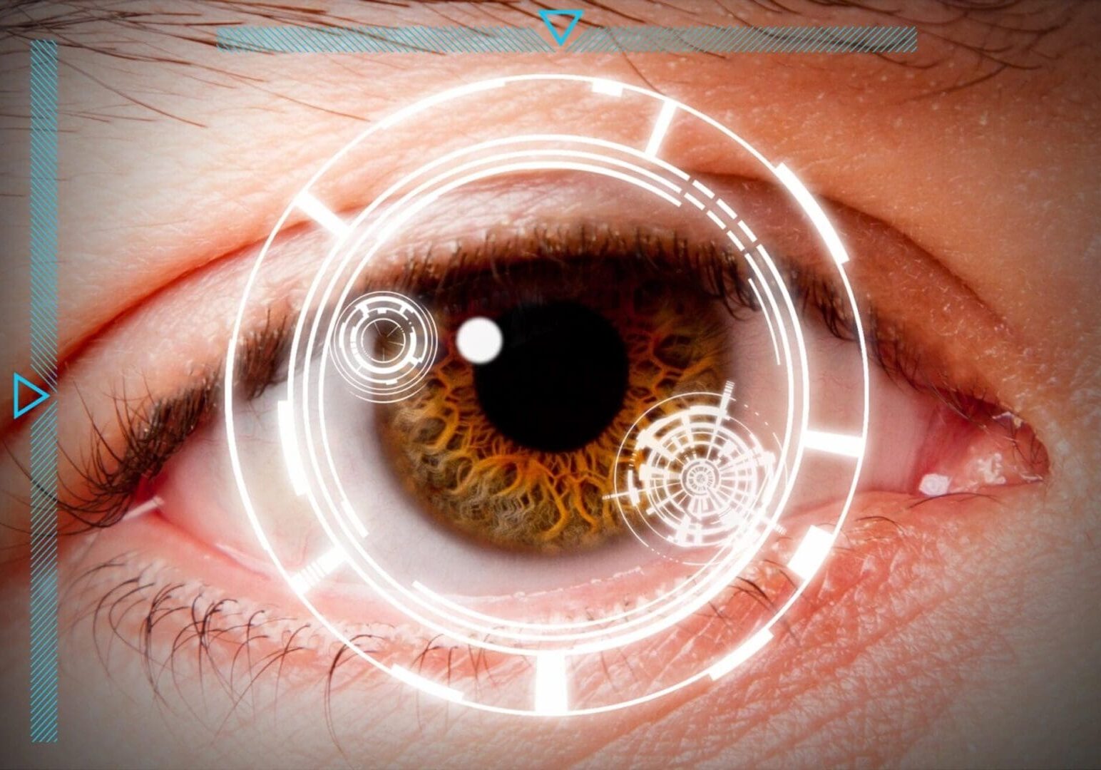 A close up of an eye with a futuristic image in the center.